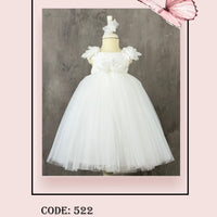 An ivory-colored dress with lace detailing and a bow at the waist, displayed on a mannequin against a pink background, with a butterfly graphic in the top right corner.